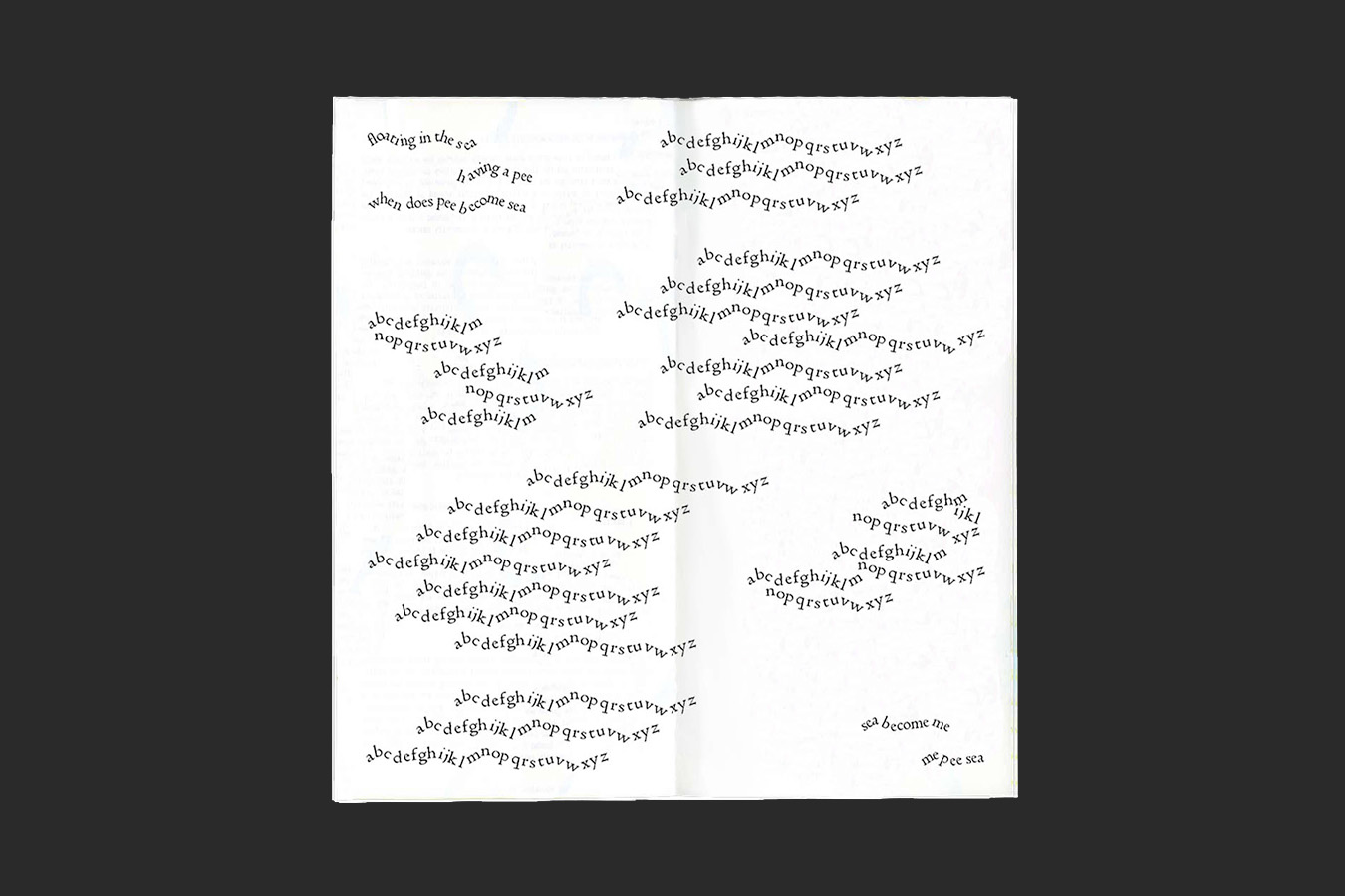 A scan of the Studio Sink Poetry booklet, a double page spread with text making wavey lines spreading across both pages.